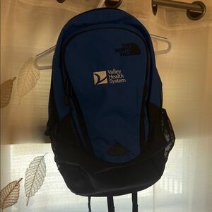 The North Face Blue and Black Backpack with Valley Health System Logo